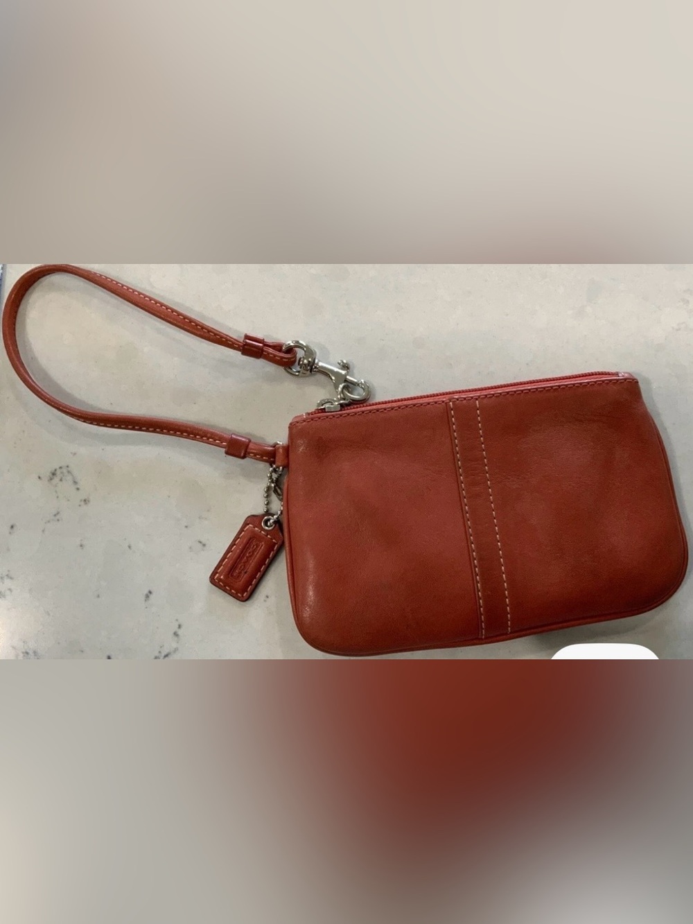 Y2K burnt orange Coach leather wristlet